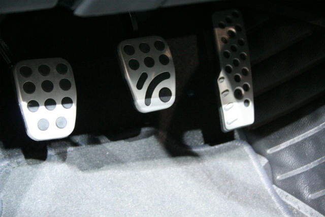 Why seatbelt buttons are red, and other quirky car design questions